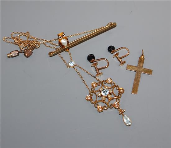 A yellow metal, aquamarine and pearl openwork pendant on fine chain and three other items,